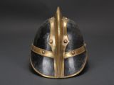 a close up of a helmet on a black surface