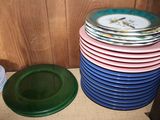 many plates stacked on top of each other on a table