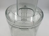 an image of a food processor on a white surface