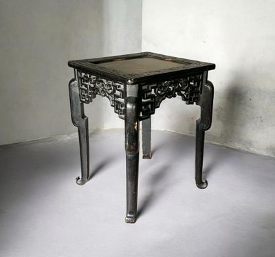 a small table that is sitting in a room