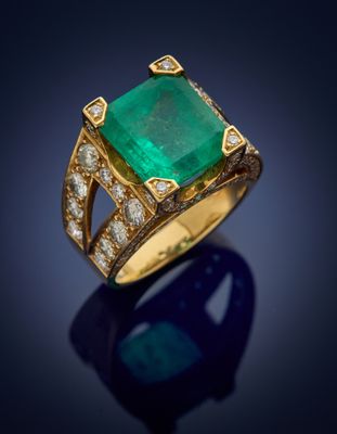 an emerald and diamond ring