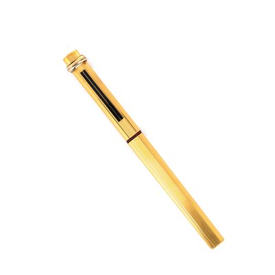 a close up of a pen on a white background