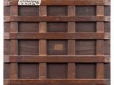 a close up of a wooden shelf with a sign on it