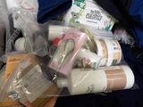 a lot of items in the bag on the table