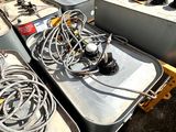 a lot of electrical equipment that are sitting on the ground