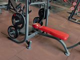 a picture of a gym with a lot of exercise equipment