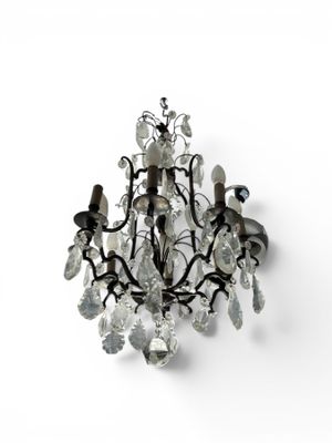 a chandelier that has a bunch of crystals hanging from it