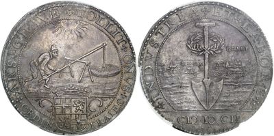 a close up of a coin with a sword and shield on it