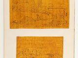 an old book with two drawings on it and a picture of a city