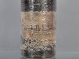 a glass jar that has some type of stuff inside of it