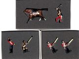 four miniature figurines of a horse and a man in uniform