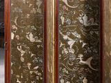 a room divider that has a picture of animals on it