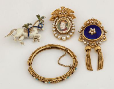 three pieces of jewelry including a broochle, a bracelet, and a broochele
