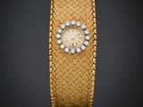 une montre-bracelet en or 18 carats et diamants, signée Cartier