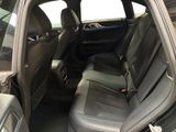 the back seats of a car are empty in a parking lot