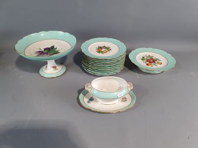 many plates and cups that are sitting on a table