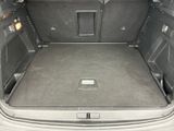 a trunk of a car with the doors open