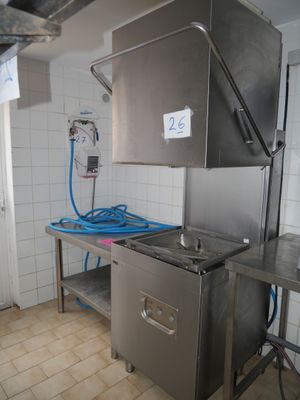 an image of a kitchen with a sink and a refrigerator