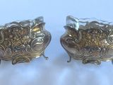 pair of antique silver plated candlestick holders with lion heads