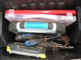 many tools in the back of a truck that is full of stuff