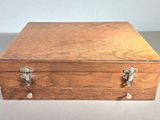 a small wooden box that is on a table