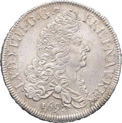 une pièce d'argent portant une tête de femme
