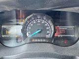 a close up of a dashboard with a speedometer