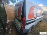 an image of a van parked in a lot