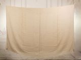 a white cloth hanging on a wall in a room