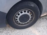 a close up of a car tire with a flat tire