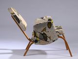 an image of a chair with a broken back and a broken seat