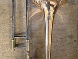 a brass instrument that is sitting on a table