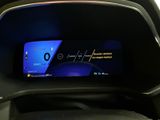 the dashboard of a car with a digital display in the center