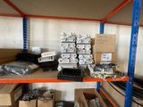 many boxes and boxes on a shelf in a warehouse