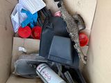 a cardboard box with a bunch of items inside of it