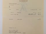 a close up of a piece of paper with a receipt on it