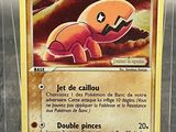 a card with a picture of a pokemon character on it
