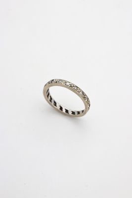a close up of a ring on a white surface