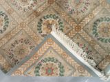 a rug that has been cleaned and is laying on the floor