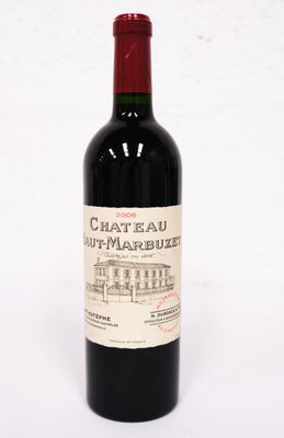 a bottle of wine that is sitting on a table