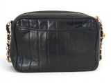 black leather cross body bag with gold chain strap