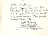 an old letter written in french on a piece of paper