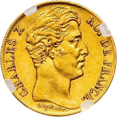 gros plan d'une pièce d'or portant un visage de femme