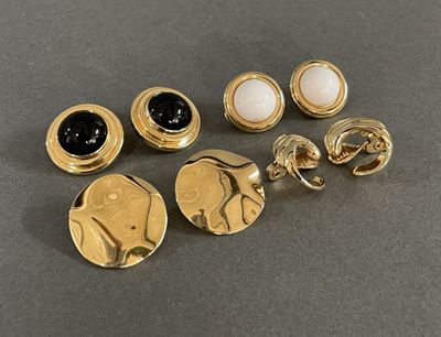 six pairs of gold tone earrings and rings