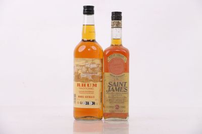 two bottles of liquor sitting next to each other on a white surface
