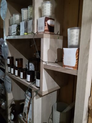 a shelf full of jars and jars on a shelf