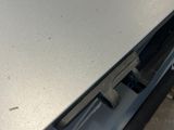 a metal table with a metal plate on top of it