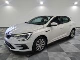 a white car parked in a room with a checkered floor
