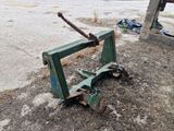 a piece of machinery that is laying on the ground