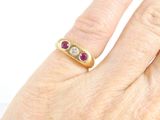 an image of a woman ' s hand with a ring on it